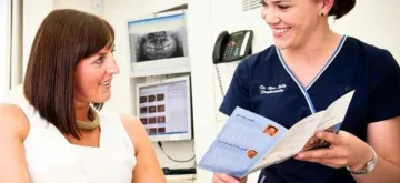 Understanding Dental Sedation blog image of a woman being explained the process