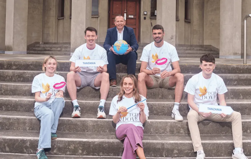 Picture of CEO Colm Davitt and Trinity students for the DOVE program